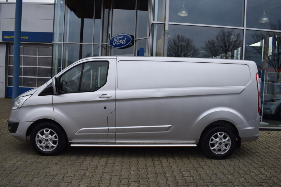 Ford Transit Custom 2.2 TDCI 155 pk! L2H1 Champions Edition Trekhaak | Cruise Control | Camera | Airco | Lederen Bekleding |