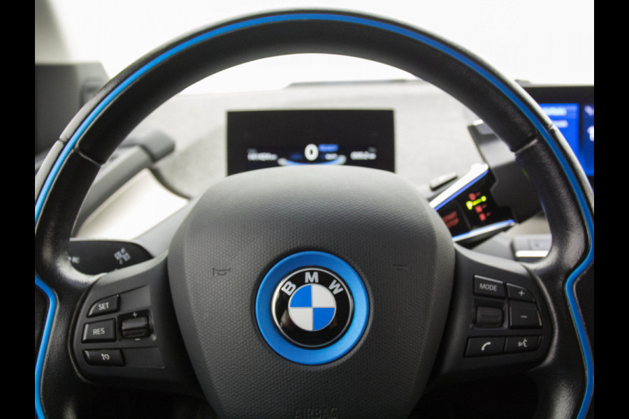 BMW i3 Navi-Pro 19 lm Harman Kardon Conncected Teleservices Warmtepomp BotsWaarsch. Led Ecc Keyless BAS ESP ASR RegenSensorStoel+Ruitensproeier-verwarming PDC Teleservice DAB Acoust voetg-besch regensensor Intelligent noodroep Snellader Comfort pack advance Basis iPerformance 94Ah 33 kWh