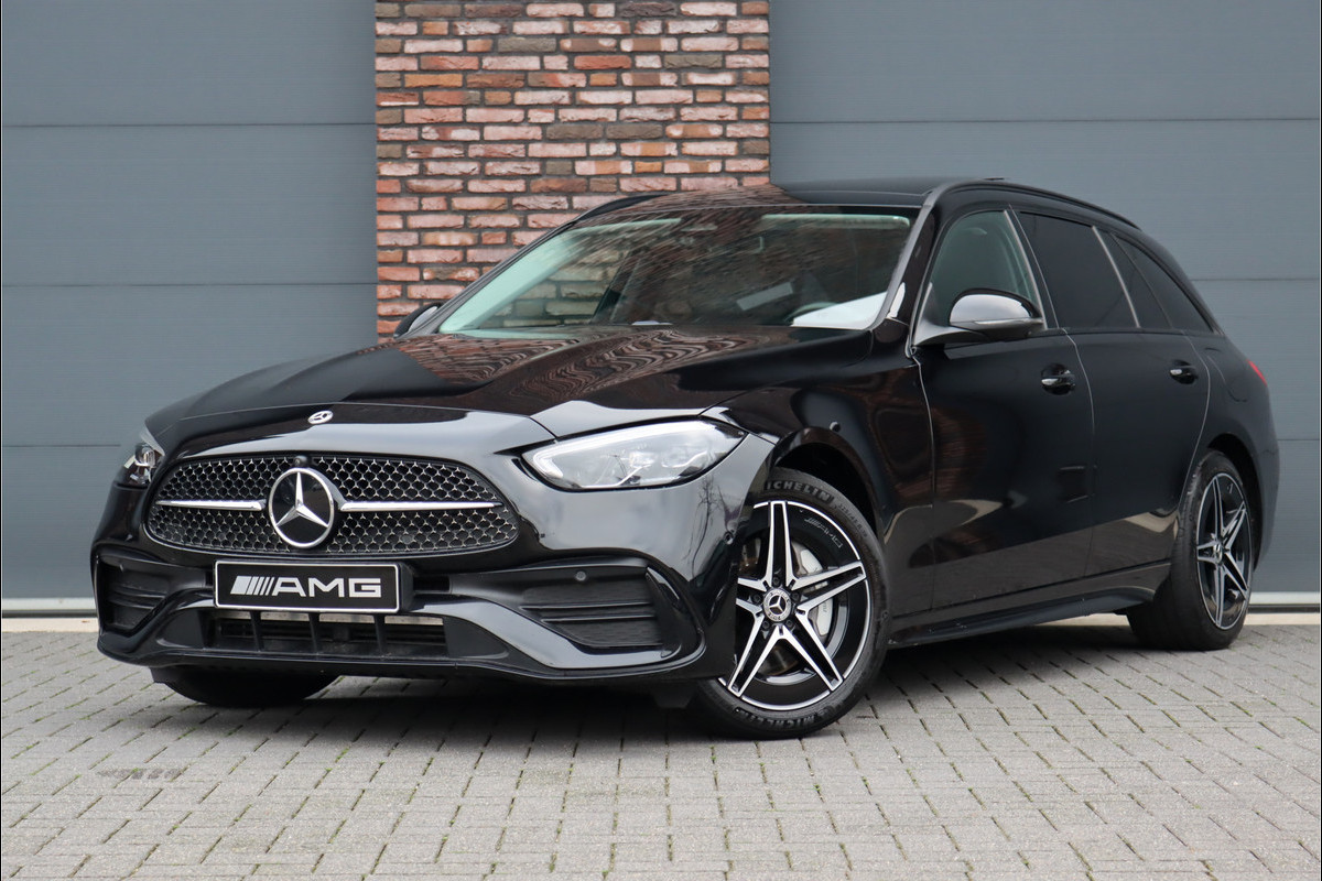 Mercedes-Benz C-Klasse Estate 300 e AMG Line Aut9 | Nappa Leder | Panoramadak | Distronic+ | Memory | Trekhaak | Surround Camera | Verwarmd Stuurwiel | Augmented Reality | Nightpakket |