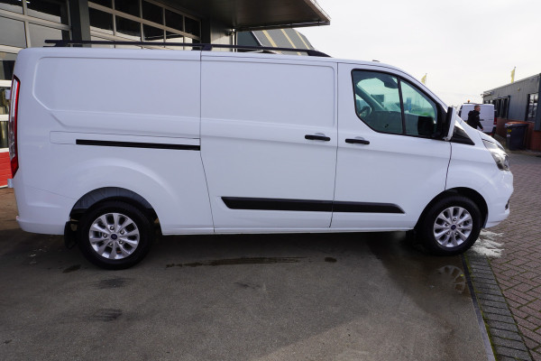 Ford Transit Custom 300L 2.0 TDCI 130PK L2H1 Trend Raptor Edition Nr. V114 | Airco | Cruise | Camera | Trekhaak | Betimmering | LM Velgen