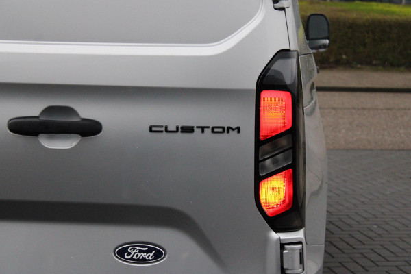 Ford Transit Custom 320 2.0 TDCI L2H1 Trend | NIEUW MODEL | Automaat 136pk | 13 inch scherm | Camera | 4-weg verstelbare bestuurdersstoel met bijrijdersbank | reservewiel | LED koplampen | Cruise Control | Moondust Silver