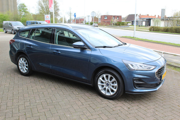 Ford FOCUS Wagon 1.0-155pk EcoBoost Mild-Hybrid Titanium. Fabrieksgarantie t/m 29-01-2027 ! SYNC 4, Volautm. airco dual,  adaptive cruise cntrl, stoel-, stuur- en voorraam verwarming, lane- en sideassist, metallic lak, LM wielen, elektr. panoramadak etc, etc.