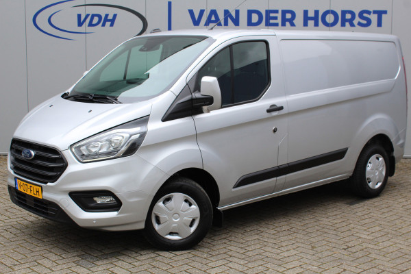 Ford Transit Custom 300 2.0-130pk TDCI L1H1 Trend. Trekgewicht 2.500kg ! Metallic lak, navigatie, telefoonvoorb., DAB radio, airco, camera, parkeersensoren v+a, winterpakket, lane- en side assist, bijrijdersbank, laadruimte betimmerd etc.