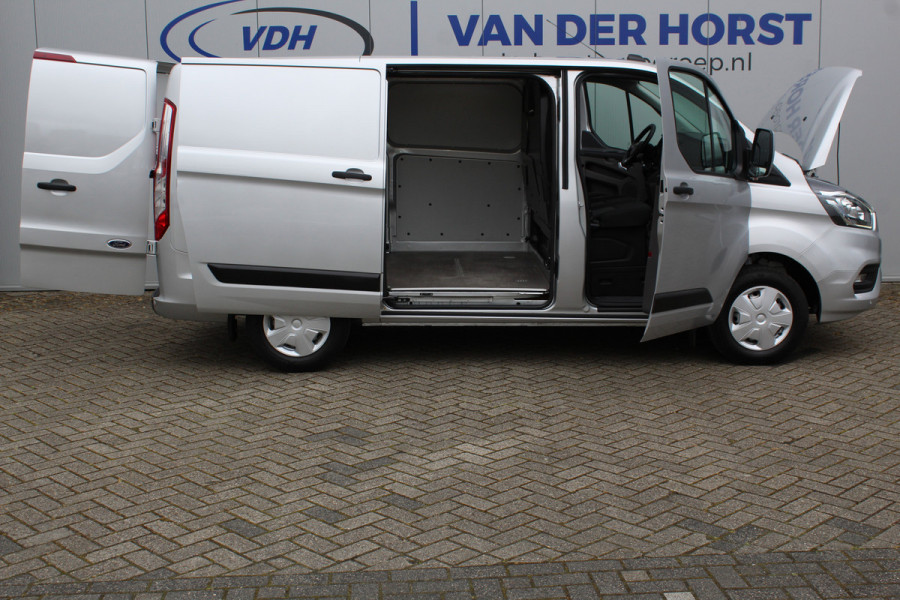 Ford Transit Custom 300 2.0-130pk TDCI L1H1 Trend. Trekgewicht 2.500kg ! Metallic lak, navigatie, telefoonvoorb., DAB radio, airco, camera, parkeersensoren v+a, winterpakket, lane- en side assist, bijrijdersbank, laadruimte betimmerd etc.