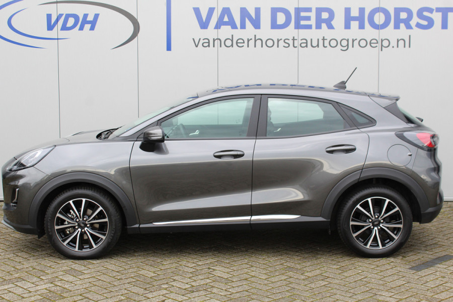 Ford Puma 1.0-125pk EcoBoost Hybrid Titanium. Garantie t/m 21-05-2027 ! Slechts 14.750km ! Volautm. airco, metallic lak, stoel-, stuur- en voorraamverwarming, navigatie, telefoonvoorbereiding, elektrische achterklep, cruise cntrl, keyless entry / keyless go etc.