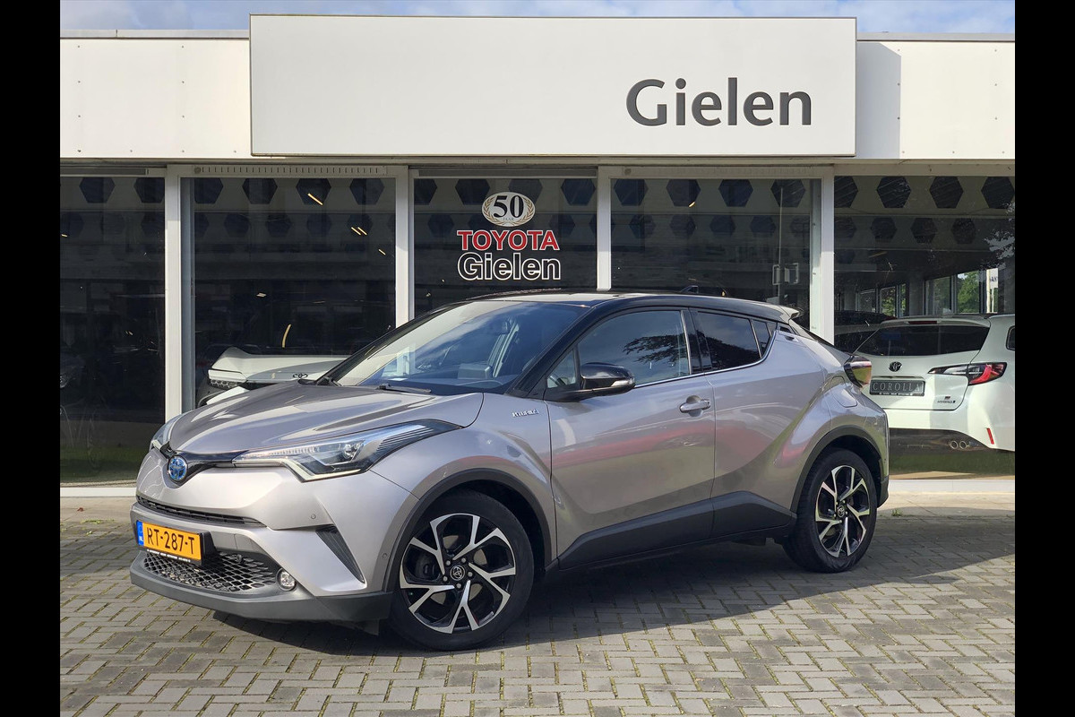 Toyota C-HR 1.8 Hybrid Bi-Tone Plus | Leer, Dodehoekherkenning, Navigatie, LED, Stoel + Stuurverwarming, 18inch, Parkeersensoren, Zeer compl