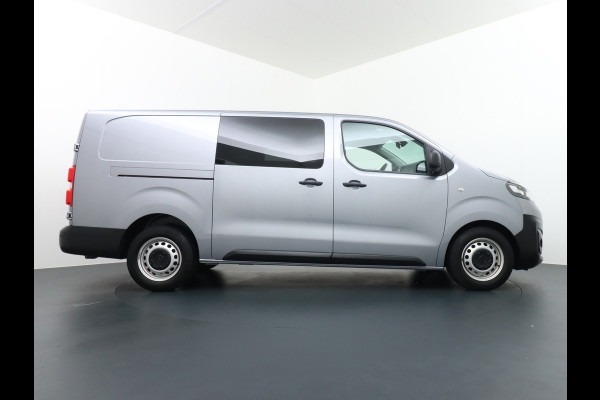 Opel Vivaro 2.0D 145pk 5pers D.C L3.H1 Navi Apple-Android Carplay Connected Trekhaak Camera Multi-Media SchuifDeur Betonplex-Vloer PDC ParkA Priv.Glass Mistlampen Licht+RegenSensor CruiseControl Uniek lengte 3 !!!! EURO 6  54.000 euro nieuw (inc btw/bpm) Org.NLSe auto 340Nm/2000rpm 2.500kg Trekvermogen!