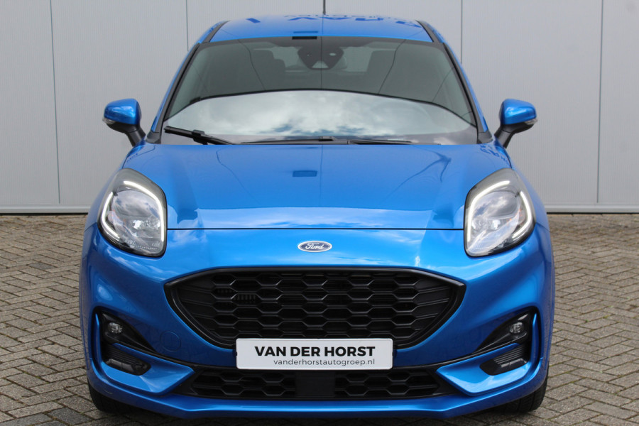 Ford Puma 1.0-125pk EcoBoost ST-Line. Sportieve hoogzitter, slechts 15.000km ! Airco, cruise cntrl, navigatie, telefoonvoorb., stoel-, stuur- en voorraamverwarming, LED verlichting, metallic lak, LM wielen, privacy glass etc.