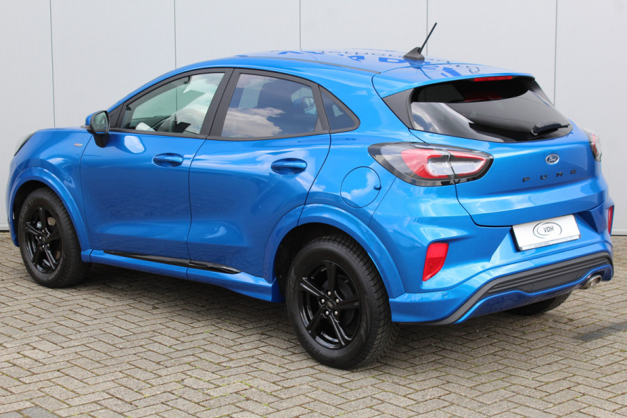 Ford Puma 1.0-125pk EcoBoost ST-Line. Sportieve hoogzitter, slechts 15.000km ! Airco, cruise cntrl, navigatie, telefoonvoorb., stoel-, stuur- en voorraamverwarming, LED verlichting, metallic lak, LM wielen, privacy glass etc.