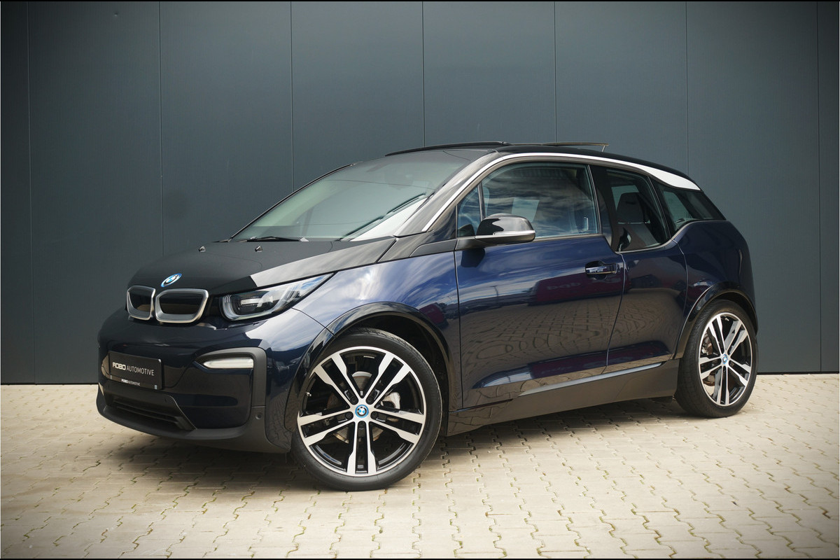 BMW i3 Business Edition Plus 120Ah 42 kWh | Panoramadak | Leer | Camera | *28.070* KM NAP | Keyless | Warmtepomp | DAB | BTW | Navigatie Prof. | Stoelverwarming | Aut. Airco | Apple Carplay | Service contract BMW |