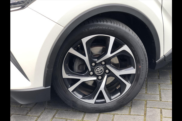 Toyota C-HR 1.8 Hybrid Bi-Tone | Trekhaak, Navigatie, Dodehoekherkenning, Stoelverwarming, 18 inch, Keyless, DAB