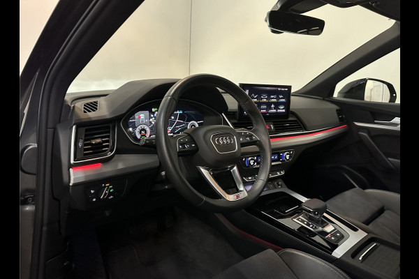 Audi Q5 50 TFSI e 300PK S-Line | 360 View | Panorama | ACC | Keyless-Go | Matrix-LED | Trekhaak | Stuurwiel verwarming | Virtual-Cockpit | 3-Zone Clima | Carplay | Tour-Pakket | Zonwering | Elek-Achterklep | Getint Glas | Draadloos Laden | MMI+ Navi |