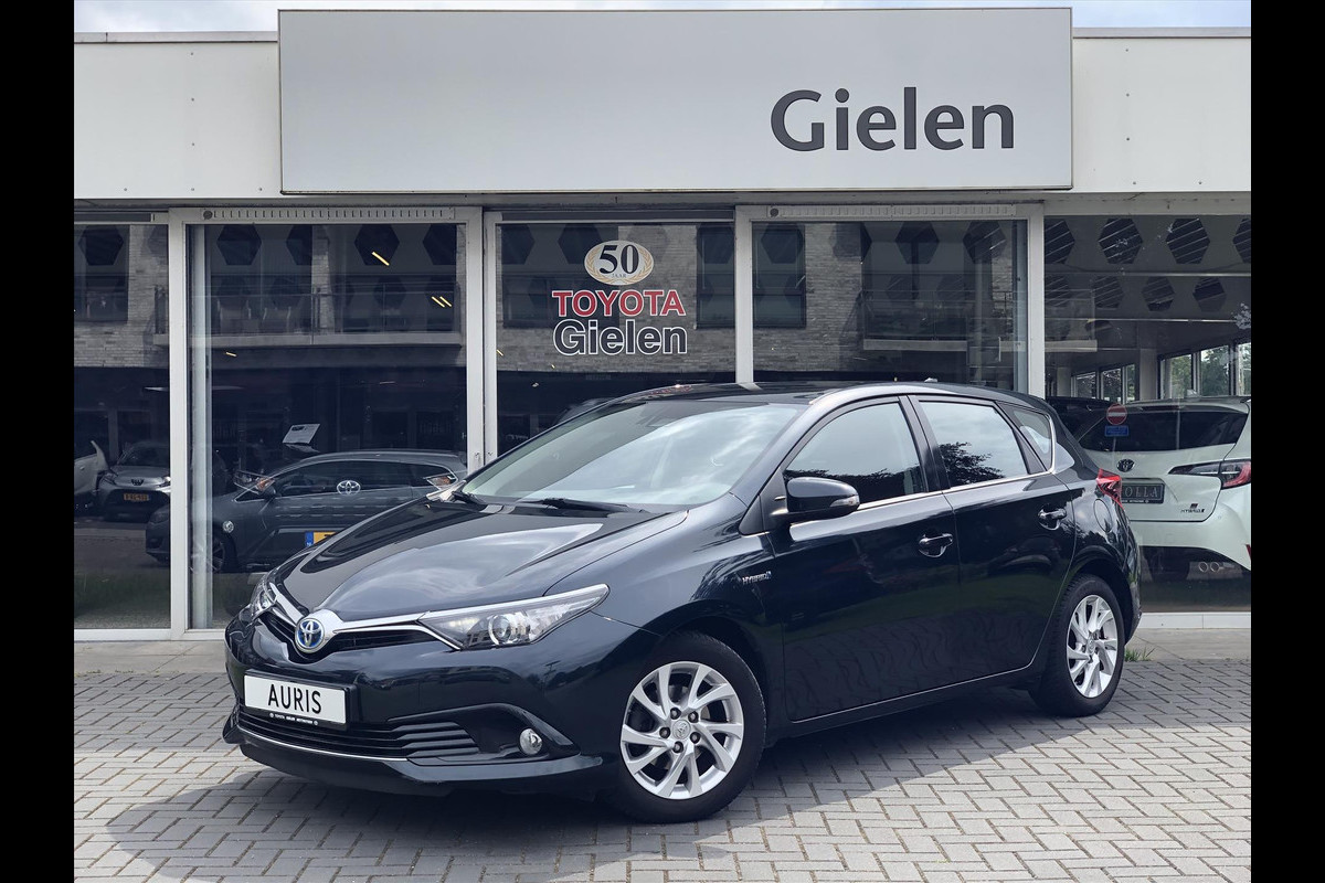 Toyota Auris 1.8 Hybrid Dynamic | Navigatie, Licht + Regensensor, Parkeercamera, Bluetooth, Stuurbediening, Lichtmetalen velgen