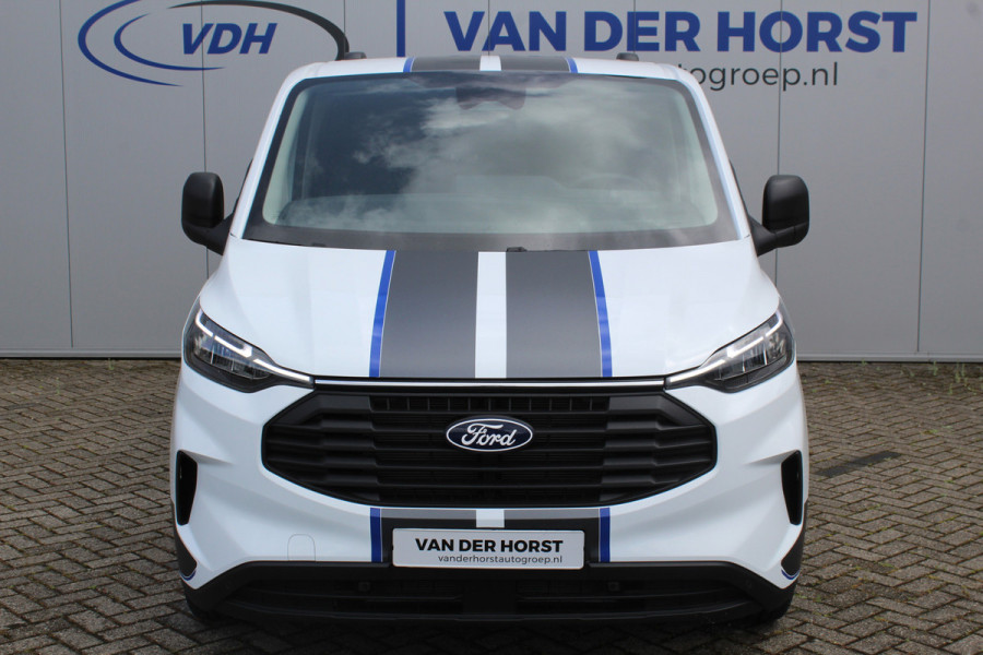 Ford Transit Custom 300 2.0-136pk EcoBlue L2H1 Trend - 'Sport Design Edition'. Overtuig u van de kwaliteiten van dit nieuwe model Ford Transit Custom ! Camera, LED koplampen, LM wielen, Cruise Control, Aut. Airco, App Connect, Winterpack etc.