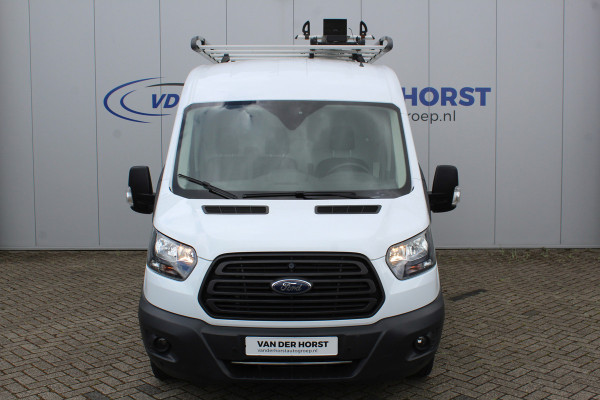 Ford Transit 290 2.0-105pk TDCI L2H2 Ambiente. Dames en heren ondernemers, u kunt direct los: compleet ingerichte Ford Transit ! Camera, parkeersensoren v+a, airco, ladder op achterdeur, opstaptrede met trekhaak, imperiaal met ladder, omvormer naar 220V voor opladen gereedschap etc etc.