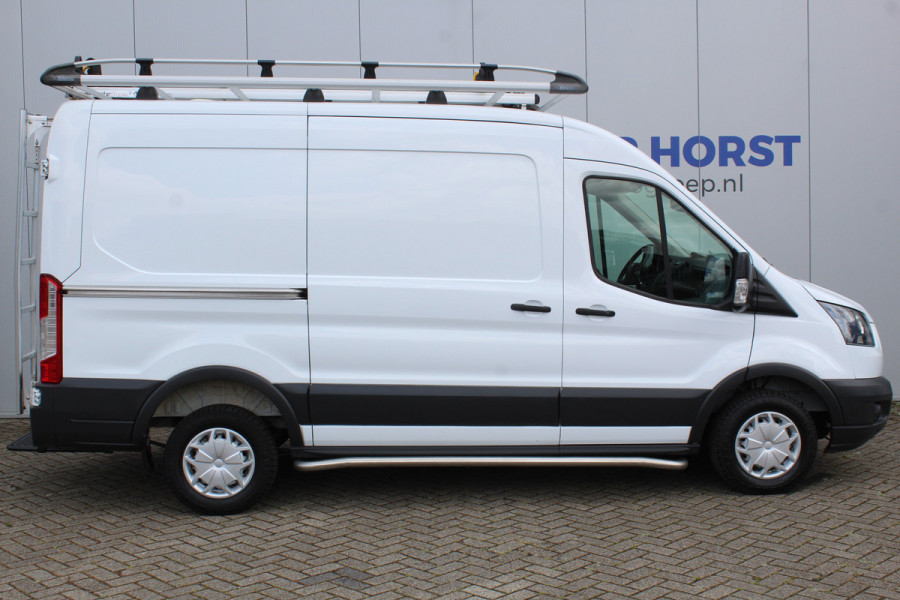 Ford Transit 290 2.0-105pk TDCI L2H2 Ambiente. Dames en heren ondernemers, u kunt direct los: compleet ingerichte Ford Transit ! Camera, parkeersensoren v+a, airco, ladder op achterdeur, opstaptrede met trekhaak, imperiaal met ladder, omvormer naar 220V voor opladen gereedschap etc etc.