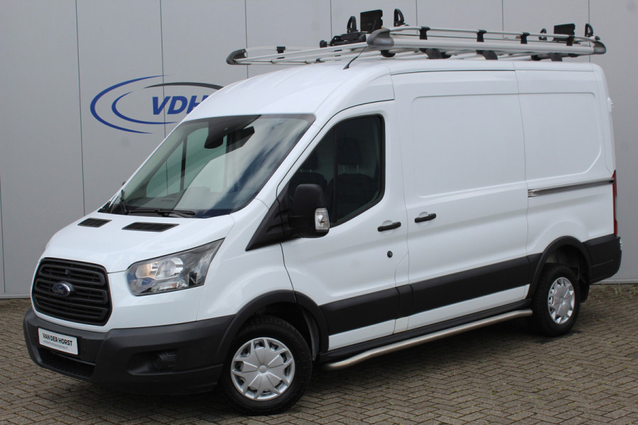 Ford Transit 290 2.0-105pk TDCI L2H2 Ambiente. Dames en heren ondernemers, u kunt direct los: compleet ingerichte Ford Transit ! Camera, parkeersensoren v+a, airco, ladder op achterdeur, opstaptrede met trekhaak, imperiaal met ladder, omvormer naar 220V voor opladen gereedschap etc etc.