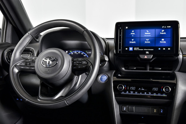 Toyota Yaris Cross 1.5 Hybrid Adventure Automaat Dig. Cockpit | Head-up Disp.| Treeplank | Adapt. Cruise | Stoel + Stuurverw. | Camera | PDC | NAV + App. Connect | Auto. Airco | JBL | LM 18"| 9960