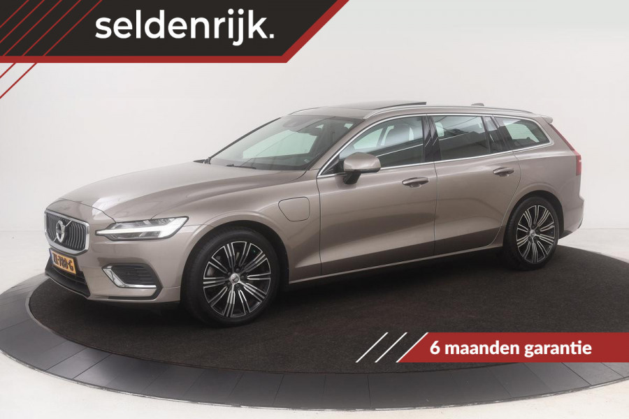 Volvo V60 2.0 T8 Twin Engine Inscription | Carplay | Trekhaak | PDC | Navigatie | Panoramadak | Leder | Stoelverwarming | Full LED