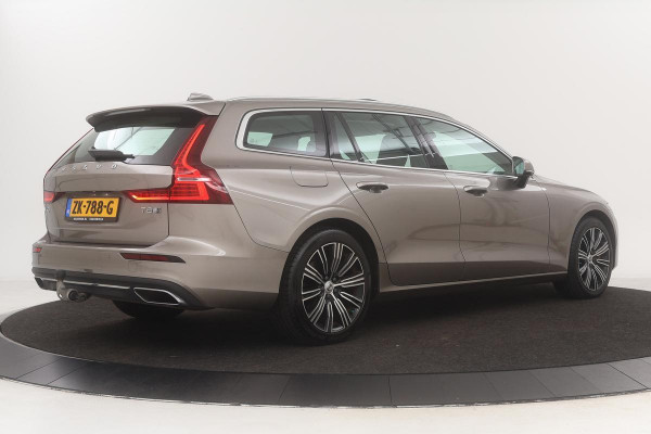 Volvo V60 2.0 T8 Twin Engine Inscription | Carplay | Trekhaak | PDC | Navigatie | Panoramadak | Leder | Stoelverwarming | Full LED