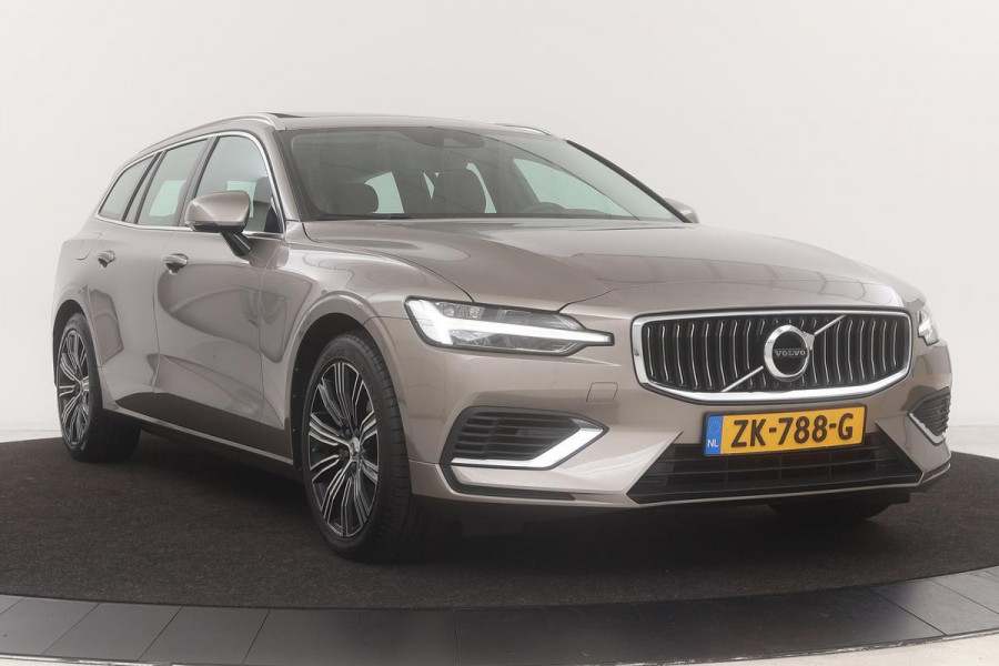 Volvo V60 2.0 T8 Twin Engine Inscription | Carplay | Trekhaak | PDC | Navigatie | Panoramadak | Leder | Stoelverwarming | Full LED