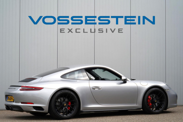 Porsche 911 3.0 Carrera GTS / 4wielbesturing / Sport Chrono / Sportuilaat / Dealer onderhouden / NL-Auto!