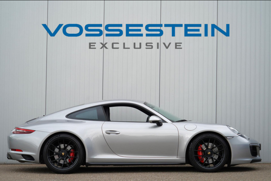 Porsche 911 3.0 Carrera GTS / 4wielbesturing / Sport Chrono / Sportuilaat / Dealer onderhouden / NL-Auto!