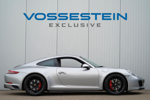 Porsche 911 3.0 Carrera GTS / 4wielbesturing / Sport Chrono / Sportuilaat / Dealer onderhouden / NL-Auto!