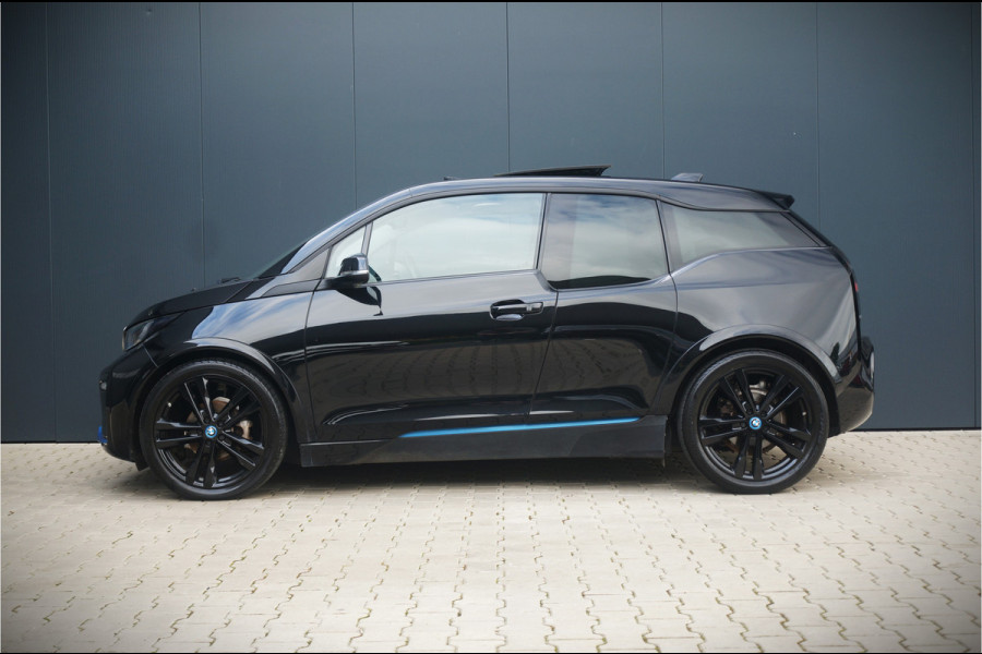 BMW i3 S 120Ah 42 kWh | Panoramadak | Leer | Camera | Keyless | Warmtepomp | Navigatie Prof. | Stoelverwarming | DAB | BTW | NAP | Led | Aut. Airco | Groot Scherm | Dealer Onderhouden |