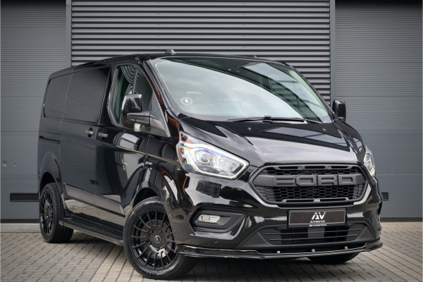 Ford Transit Custom 300 2.0 TDCI L2H1 | Camera | CarPlay | Stoelverwarming | Raptor Edition | Lane Assist | Stoelverwarming | Trekhaak | Airco | 3-Zitter | Nieuwe APK | Onderhoudsbeurt