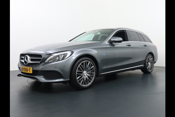 Mercedes-Benz C-Klasse Estate 350Hybrid 279pk AIRMATIC Camera Navi Lmv 1/2 Leer ParkAssist PDC v+a Automatische Achterklep 18" Ecc AMG lnst.lijsten Alu Luchtvering Regen-Licht sensor  Cruise Control Stoelverwarming Multifunct. Stuur  Privacy Glas Edition