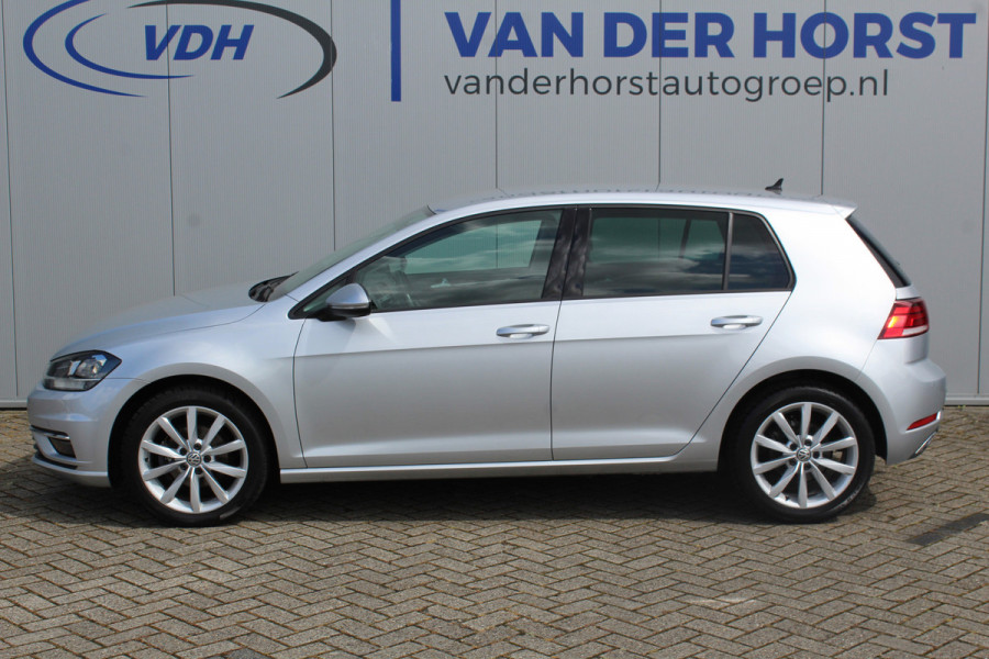 Volkswagen Golf 1.0-115pk TSI Highline. Mooie 5 deurs Volkswagen Golf in de chique Highline uitvoering. Volautm. airco dual, navigatie, telefoonvoorb., camera, parkeersensoren v+a, metallic lak, trekhaak, LM wielen, adaptive cruise control, ski luik etc.