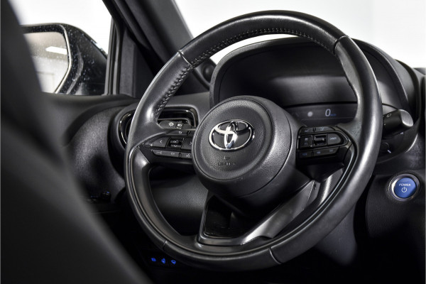 Toyota Yaris Cross 1.5 Hybrid 116 PK Adventure Automaat | Dig. Cockpit | Head-up Disp. | Adapt. Cruise | Stoel- + Stuur- + Voorruitverwarming | Camera | PDC | NAV + App. Connect | JBL | Auto. Airco | Afn. Trekhaak | LM 18"|