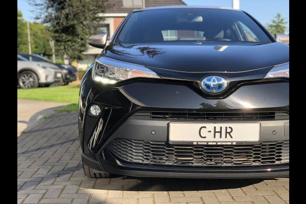 Toyota C-HR 2.0 Hybrid Bi-Tone | Dodehoekherkenning, Apple CarPlay/Android Auto, 18 inch, Keyless, Stoel + Stuurverwarming