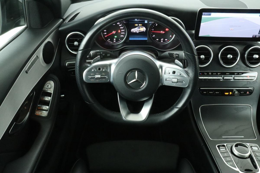 Mercedes-Benz C-Klasse 200d AMG | Stoelverwarming | Camera | Carplay | Navigatie | Full LED | Half leder | Cruise control | Park Assist | Climate control