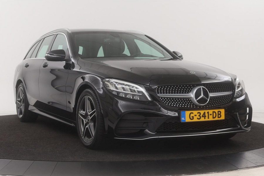 Mercedes-Benz C-Klasse 200d AMG | Stoelverwarming | Camera | Carplay | Navigatie | Full LED | Half leder | Cruise control | Park Assist | Climate control