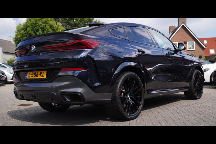 BMW X6 XDrive40i High Executive | Panorama | 360cam | Carbon | Adaptieve cruise control | Kristallen pook | 22 inch | Dealer onder