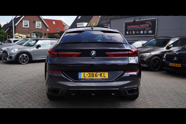 BMW X6 XDrive40i High Executive | Panorama | 360cam | Carbon | Adaptieve cruise control | Kristallen pook | 22 inch | Dealer onder