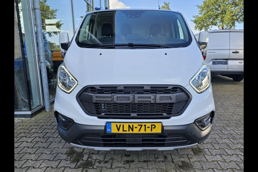 Ford Transit Custom 300 2.0 TDCI L2H1 Trail Glasslook panelen | Raptor grille | Camera | Trekhaak | Leder | Voorruitverwarming | Airco | Cruise control etc.