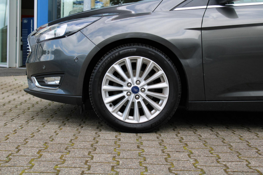 Ford Focus 1.0 Titanium | Climate Control | Navigatie | Cruise Control | Parkeersensoren | Lichtmetalen Velgen |