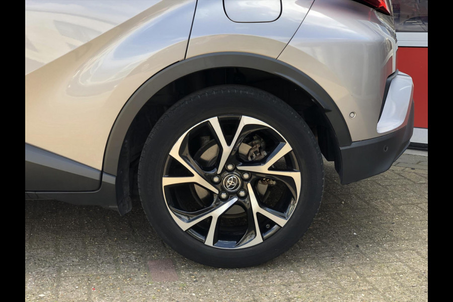 Toyota C-HR 1.8 Hybrid Bi-Tone Plus | Eerste eigenaar, JBL, Dodehoekherkenning, Parkeersensoren, Stoelverwarming, Keyless, 18 inch