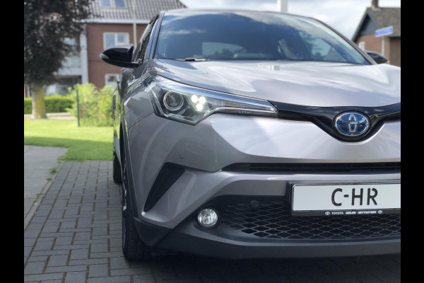 Toyota C-HR 1.8 Hybrid Bi-Tone Plus | Eerste eigenaar, JBL, Dodehoekherkenning, Parkeersensoren, Stoelverwarming, Keyless, 18 inch