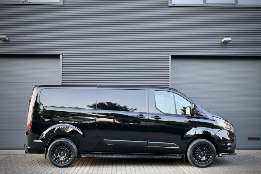 Ford Transit Custom 300 2.0 TDCI L2H1 | L+R Schuifdeur | Camera | CarPlay | Stoelverwarming | Raptor Edition Stoelverwarming | Trekhaak | Airco | 3-Zitter | Nieuwe APK | Onderhoudsbeurt