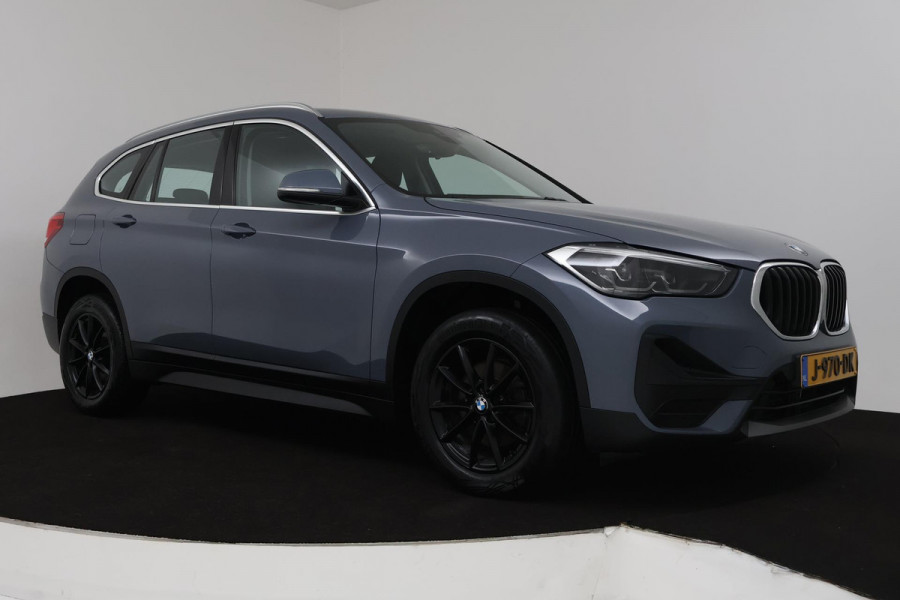 BMW X1 SDrive18i High Executive Edition Sport (NAVIGATIE, STOELVERWARMING, PDC, CLIMATE, NL-AUTO, DEALER ONDERHOUDEN)