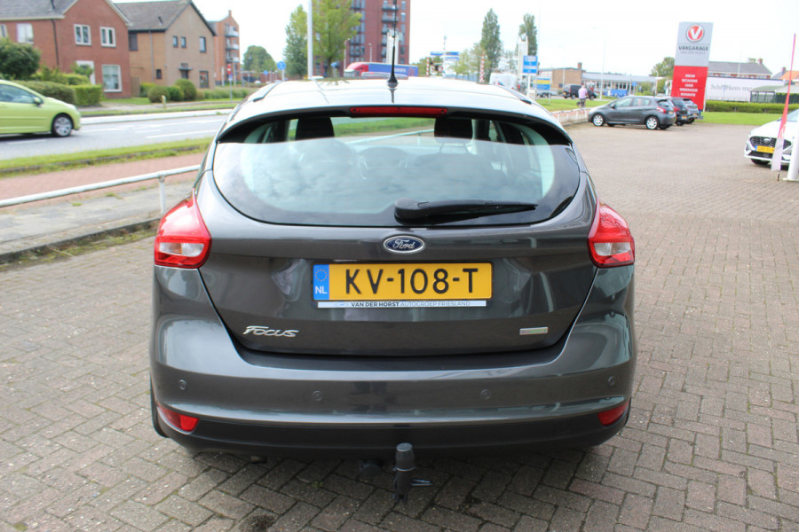 Ford Focus 1.0 Trend , 5 deurs , 100pk Navigatie , Cruise control , Airco , Voorruit verwarming Trekhaak , Bluetooth , LM velgen