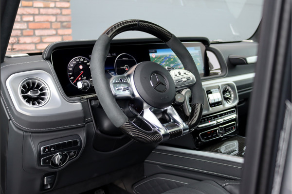 Mercedes-Benz G-Klasse AMG 63 V8 G-Manufaktur Aut9 | Grijs Kenteken | AMG Drivers Package | Distronic+ | Carbon | Massage | Nappa Leder | Trekhaak | Stoelventilatie | Energizing-pakket | Schuifdak | Techniekpakket |