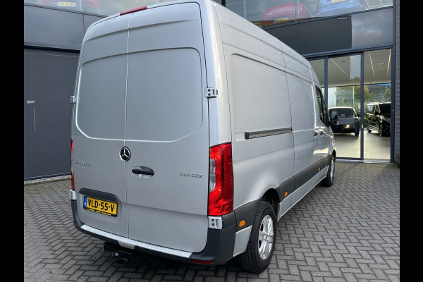 Mercedes-Benz Sprinter 314 2.2 CDI L2H2 DC Automaat 2 zitpl.RV - Zijschuifd.R - Laadvloer - Tussenschot.V - Zijwind Ass. - Vermoeidh.herkenning Clim.control - Cruise control - Apple CP/AA - Radio/USB/AUX/DAB/TEL - MF-Stuurwiel - LMV - Trekhaak - CD+AB - Keyless E+S - Ramen E-VZ - Spiegels E-V+VW - B-stoel IHV - RS