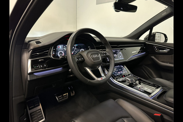 Audi Q7 55 TFSI e S-Line | Carbon | Panorama | RS Uitlaattips | Head-Up | ACC | Voll. Leder | Keyless-Go | Trekhaak 3500kg | Luchtvering | Tour-Pakket | Matrix-LED | Virtual-Cockpit | Carplay | Camera | DAB | Keyless-Go | 3-Zone Clima | Lane Assist. Rijklaarprijs incl Service en Bovag Garantie.