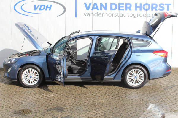 Ford FOCUS Wagon 1.0-125pk EcoBoost Mild-hybrid Titanium. Mooie, ruime, luxe en comfortabele Ford Focus wagon. Volautm. airco dual, camera, stoel-, stuur- en voorraamverw., easy entry/easy go, cruise control, Isofix, side- en lane assist, parkeersensoren v+a, LM wielen etc.