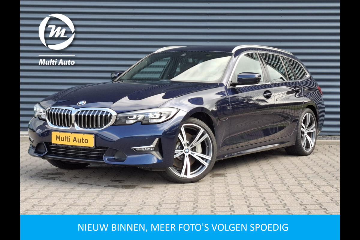 BMW 3 Serie Touring 330e Luxury Line Plug in Hybrid 293pk | Lederen Sportstoelen | Apple Carplay | Head Up | Sfeerverlichting | 360 Camera | Navigatie |